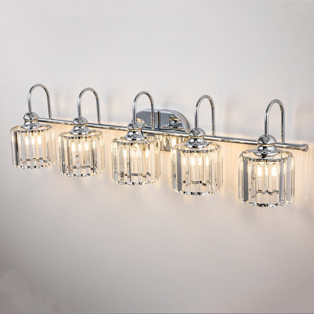 Lampada da bagno lineare Glam a 5 luci dimmerabile in cristallo con paralume cilindrico in cristallo
