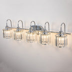 Lampada da bagno lineare Glam a 5 luci dimmerabile in cristallo con paralume cilindrico in cristallo