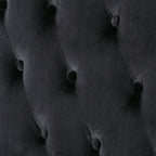 Divano a due posti con schienale alto e bottoni trapuntati in velluto nero