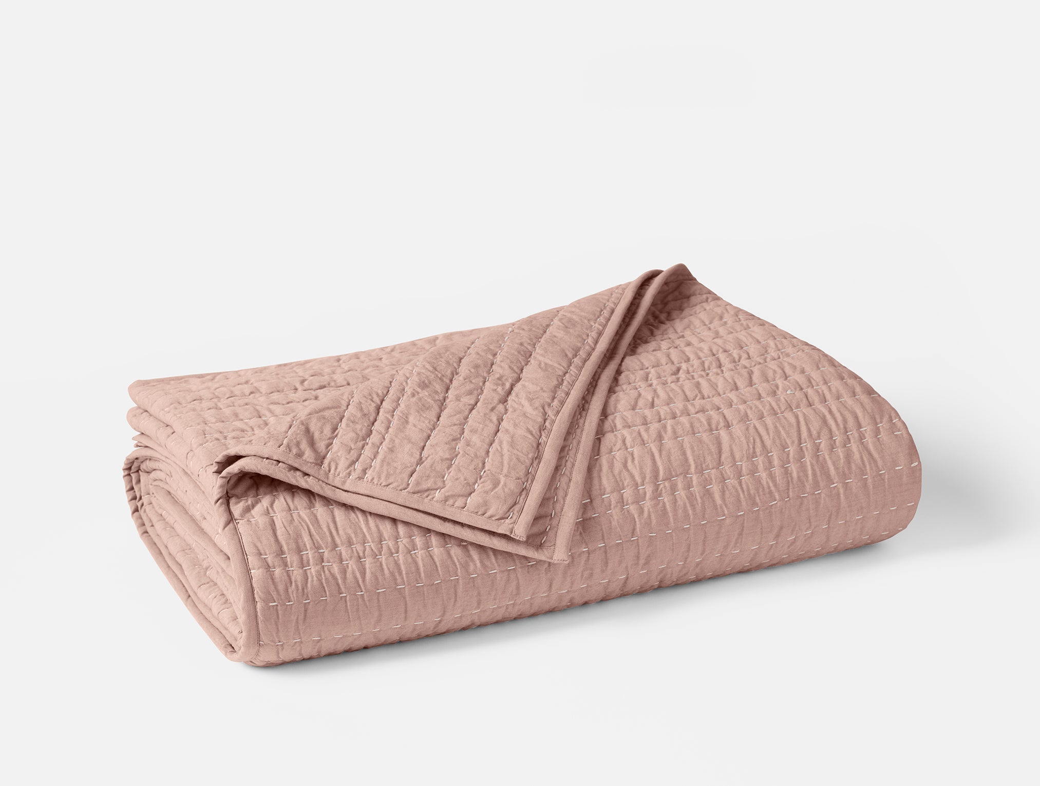 Trapunta organica cucita a mano con canali 