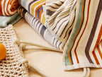 Asciugamano da spiaggia biologico Dawn Stripe - Rinnovato