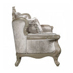 Divano imbottito con schienale capitonné in beige e champagne